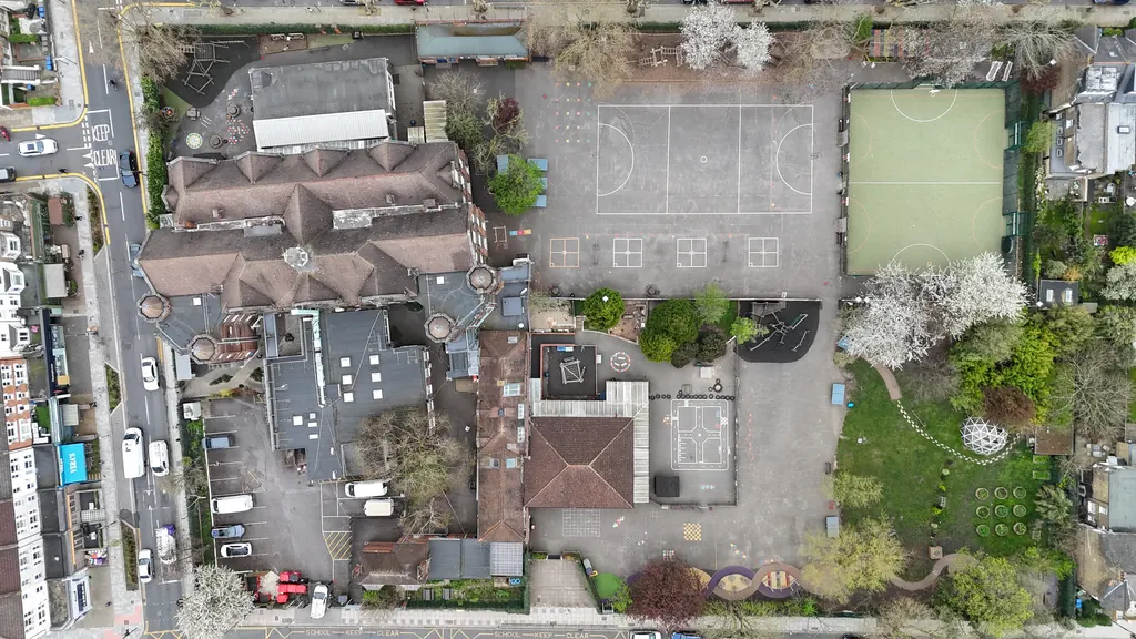Drone school inspection in Blackpool: top-down view of a school, playground and pitch
