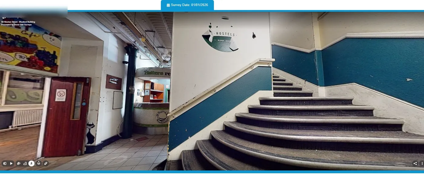 Matterport view of an internal staircase and reception area