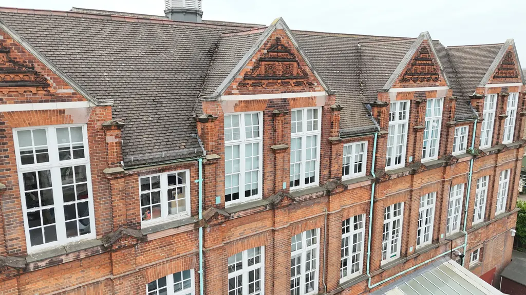 Drone school inspection in Hull: red-brick school facade with tall windows