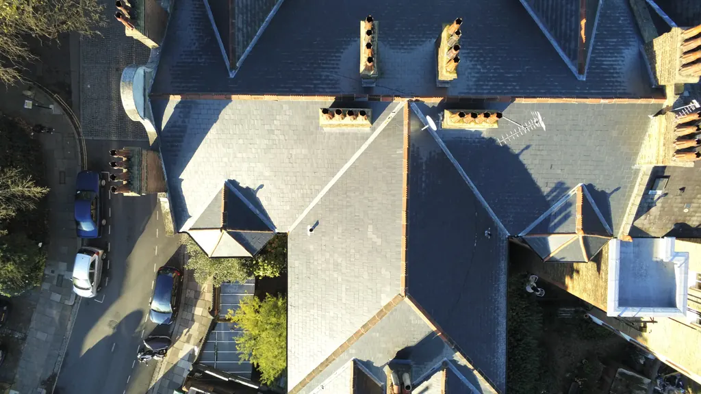 Drone inspection in London: aerial view of a large period house